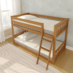 Natural wood twin bunk bed with ladder in a bright modern bedroom, white mattresses, light hardwood floor and neutral rug